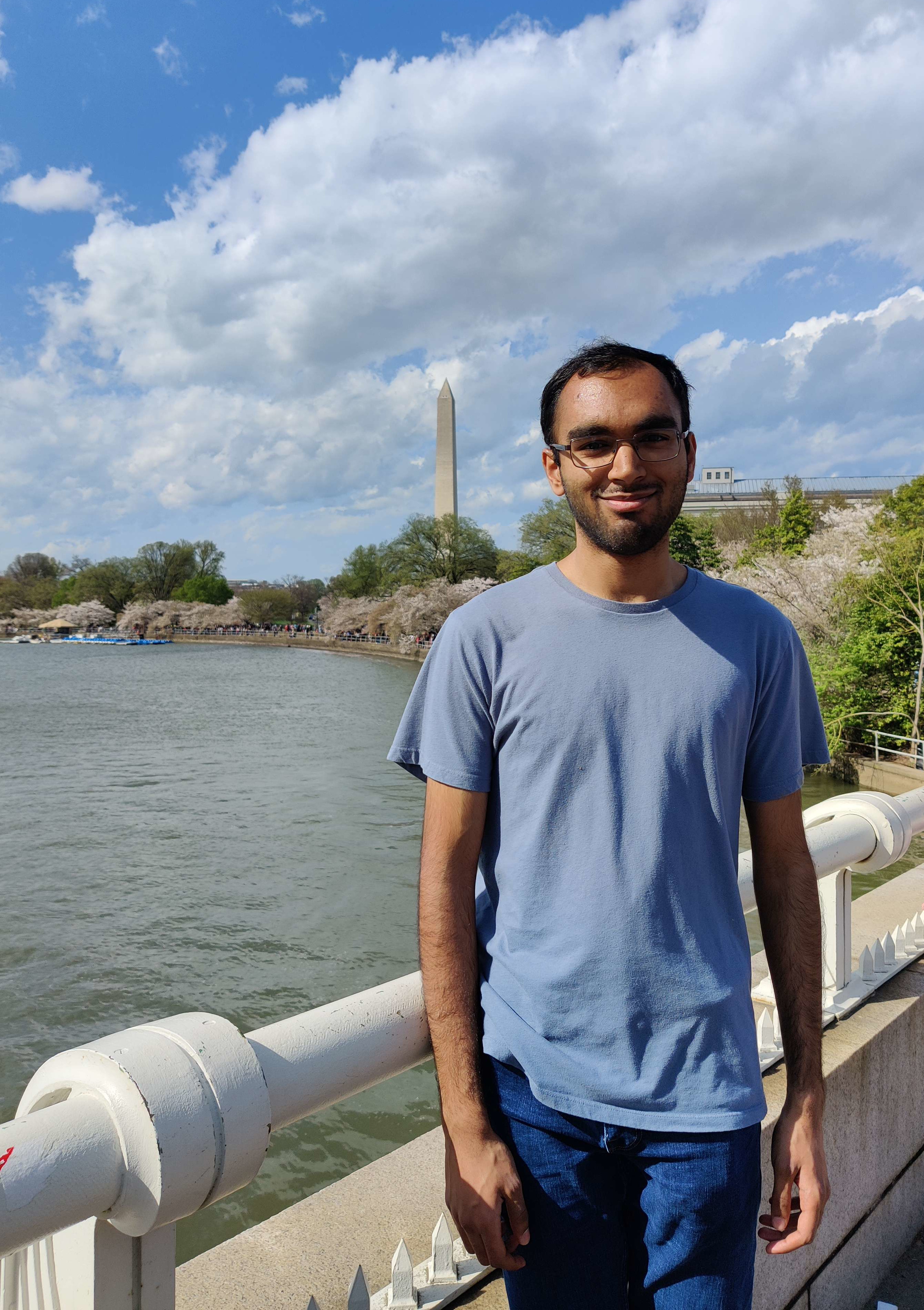 a photo of myself in front of the DC cherry blossoms